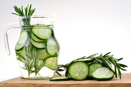 Cucumber and Rosemary Infused Water on wooden tableの写真素材