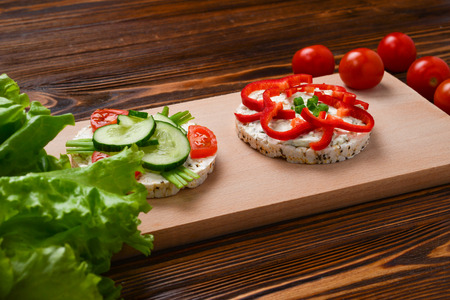 Rice wafers, cheese and cucumbers sandwiches. の写真素材