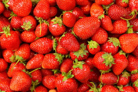 Strawberry. Fresh berries macro. Fruit background. Top view.の写真素材