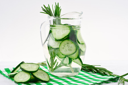 Cucumber and Rosemary Infused Water on wooden tableの写真素材