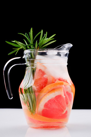 Grapefruit red juicy slices background. top viewの写真素材