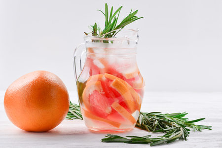 Grapefruit red juicy slices background. top viewの写真素材