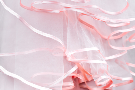 Wedding dress detail. Pink wedding dress frills close up.の写真素材