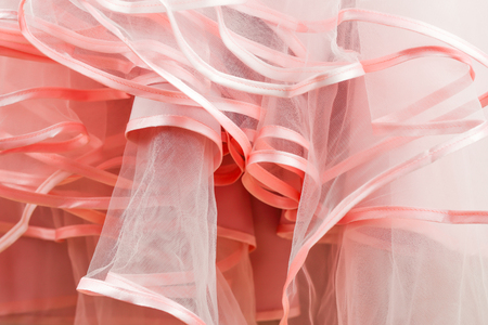 Wedding dress detail. Pink wedding dress frills close up.の写真素材