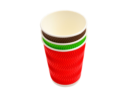 Paper cups for vaious drinks. Red, green, brown. Empty paper cups. Isolated on white.の写真素材