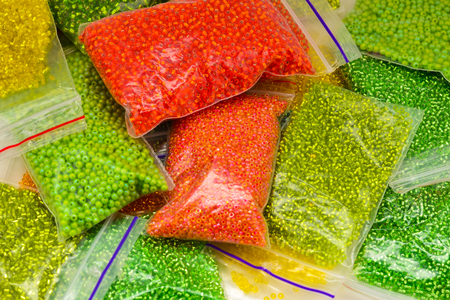 Bags with multi-colored beads for beadwork and needleworkの写真素材