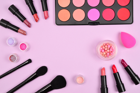 Professional makeup products with cosmetic beauty products, blushes, eye liner, eye lashes, brushes and tools.の写真素材