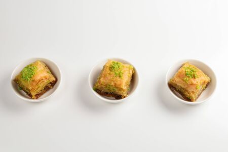 Pistachio baklava on a white background. Dessert.の写真素材