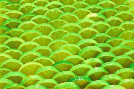 Fresh lime slices as a background.の写真素材