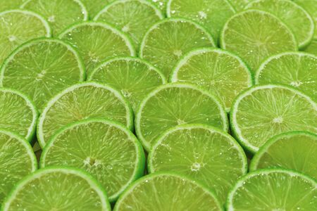 Fresh lime slices as a background.の写真素材