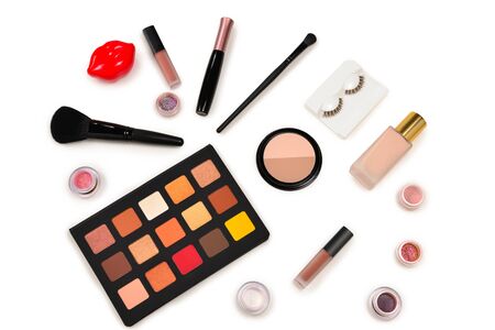 Professional makeup products with cosmetic beauty products, eye shadows, pigments, lipsticks, brushes and tools. Space for text or design.の写真素材