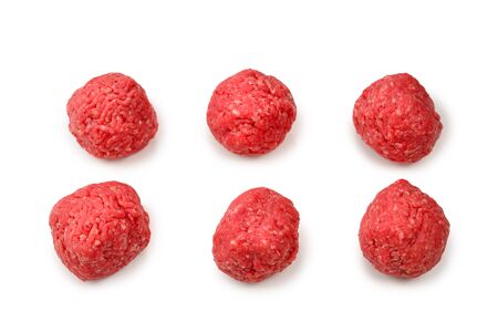 Raw meat balls isolated on white background.の写真素材