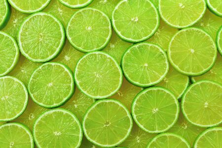 Fresh lime slices as a background.の写真素材