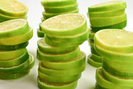 Lime slices isolated on white background. Space for text or design.の写真素材
