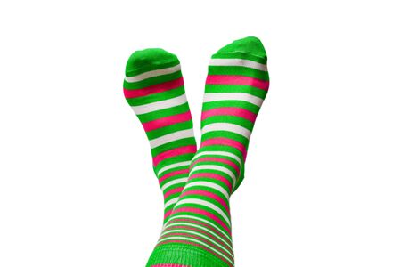 Woman in green socks isolated on white background. Top view.の写真素材