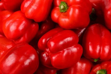 Fresh red bell pepper background. の写真素材