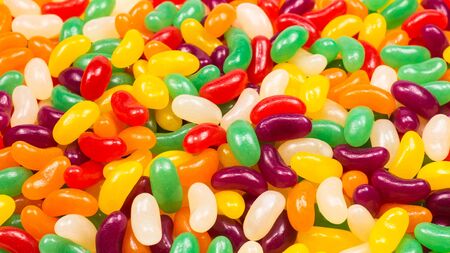 Colorful jelly beans isolated on white.の写真素材