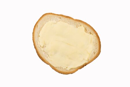 Tasty bread and butter isolated on white background.