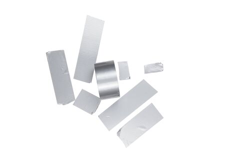 Silver tape pieces isolated on white background.の写真素材