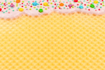 Sweet waffle background with cream. Space for text or design. の写真素材