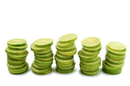 Lime slices isolated on white background. Space for text or design.