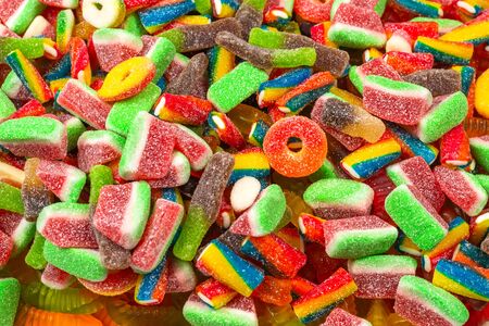 Assorted tasty gummy candies. Top view. Jelly  sweets background.の写真素材