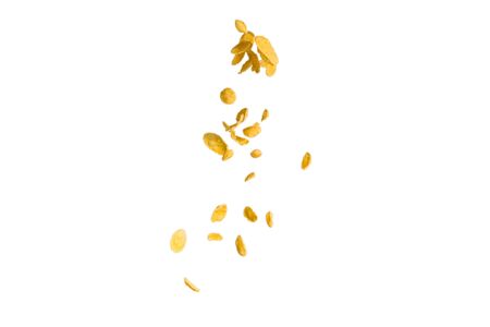 Corn flakes falling to the white bowl. Motion. Copyspace. Isolated on white.