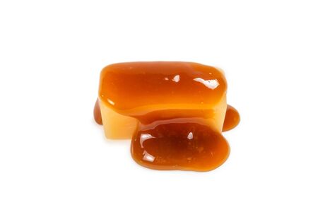 Tasty caramel candy isolated on white background. Copy space.の写真素材