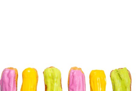 Fresh tasty eclairs isoalted on white background. Top view. 