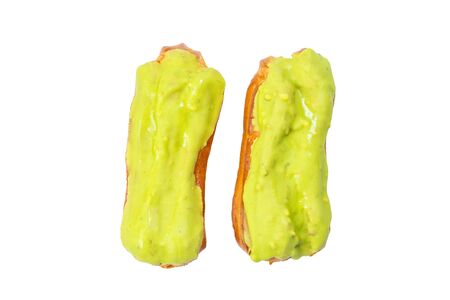 Fresh tasty eclairs isoalted on white background. Top view.