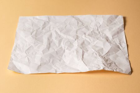 Crumpled white paper background. Top view. の写真素材