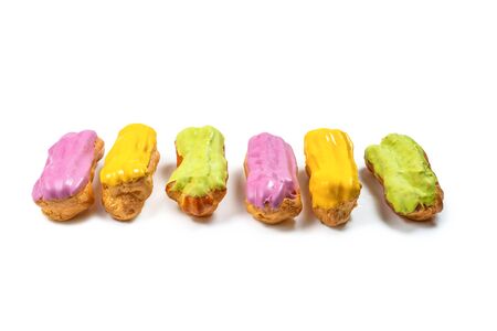 Fresh tasty eclairs isoalted on white background. Top view. 