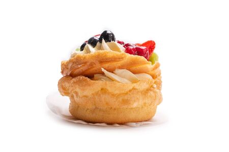 Home made cake with cream and fruits isolated on white. の写真素材