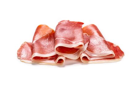 Thinly sliced jamon isolated on white background. Top view. の写真素材