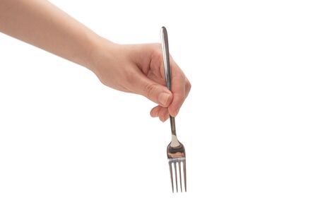 Fork in woman hand isolated on white background.