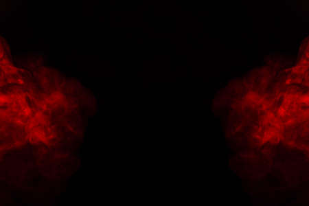 Red steam on a black background. Copy space.の写真素材