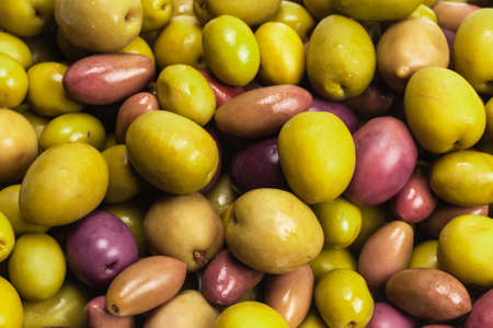 Tasty mix olives background. Top view.の写真素材