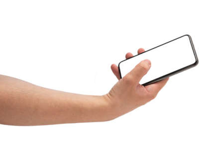 Smart phone in man hand isolated on white background. White screen. Copy space.の写真素材