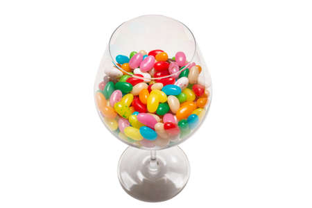 Colorful jelly beans isolated on white. Top view.