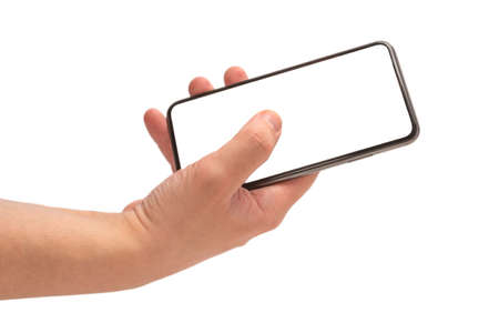 Smart phone in man hand isolated on white background. White screen. Copy space.の写真素材