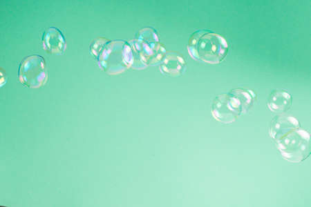 Soap bubbles isolated on a black background. Copy space.の写真素材