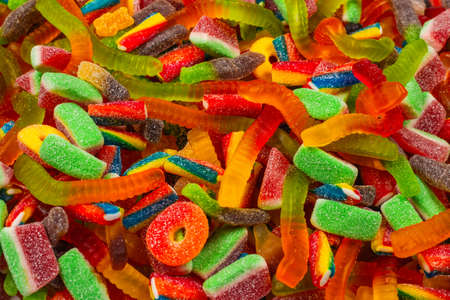 Assorted tasty gummy candies. Top view. Jelly sweets background.の写真素材