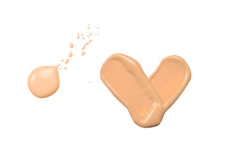 Liquid foundation smudge isolated on white background. Close Up of makeup cream sample.の写真素材