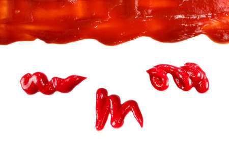 Red sauce splashes as background.の写真素材