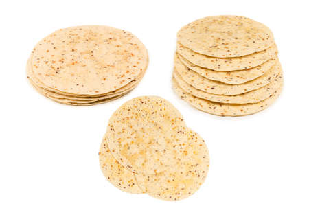 Pitta bread with seeds isolated on white