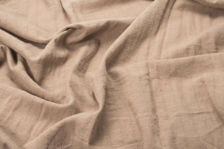 Cotton beige fabric pattern. Top view.