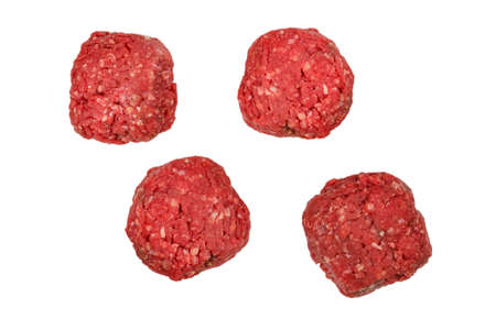 Raw meat balls isolated on white background.の写真素材