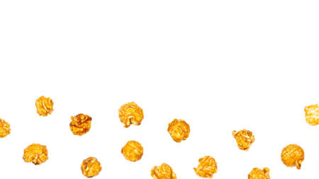Caramel pop corn isolated on white background. Copy space.の写真素材