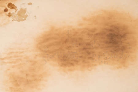 Old crumpled beige paper background.の写真素材