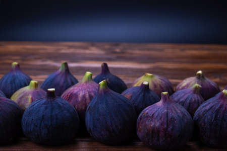 Tasty figs on a black background. Top view. Slices.の写真素材